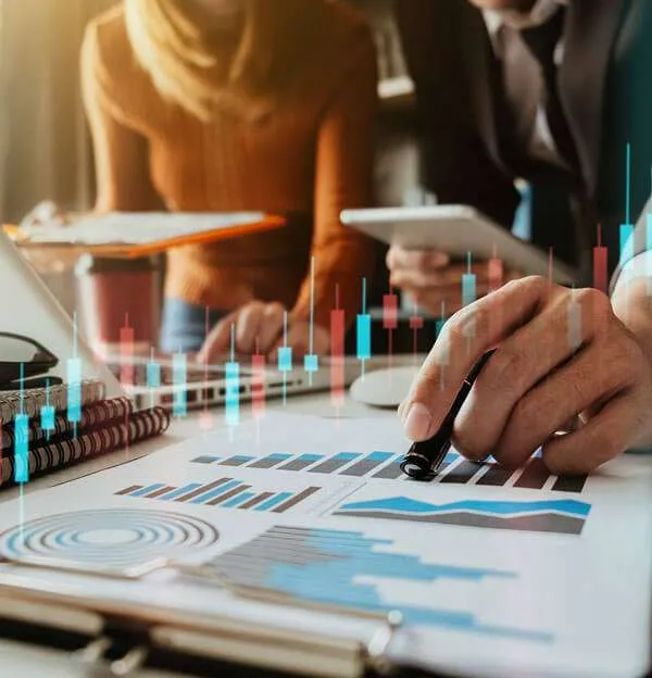 People considering statistical data during a marketing meeting