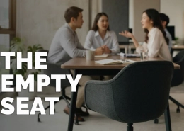 An empty chair at a small business meeting table, with colleagues seated around it out of focus — representing the vacant role of protecting a brand